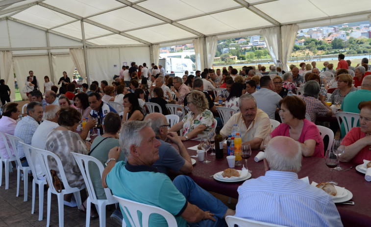 El barrio de Xuvia, en Narón, se prepara para celebrar la fiesta de exaltación de la almeja rubia