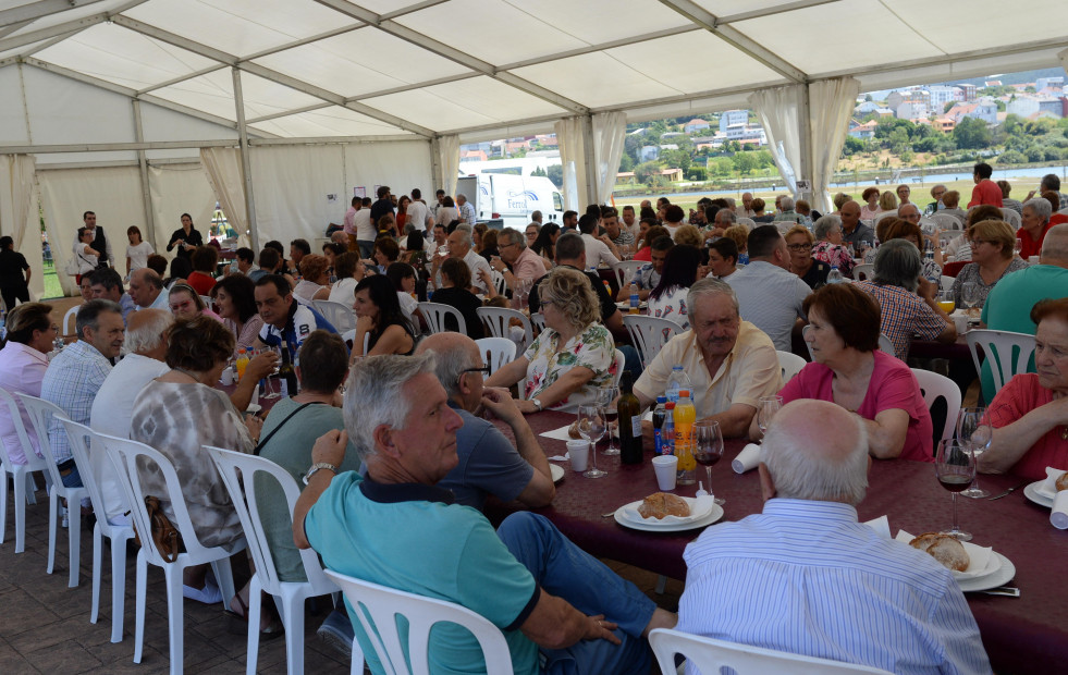 El barrio de Xuvia, en Narón, se prepara para celebrar la fiesta de exaltación de la almeja rubia