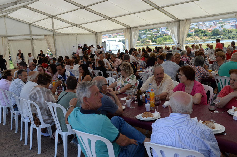 El barrio de Xuvia, en Narón, se prepara para celebrar la fiesta de exaltación de la almeja rubia