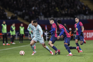 Angel Correa of Atletico de Madrid and Pedro Gonzalez Pedri of FC Barcelona